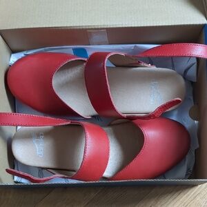 Dansko Red Mules & Clogs with Modern Design: Style Is Malin In Tomato